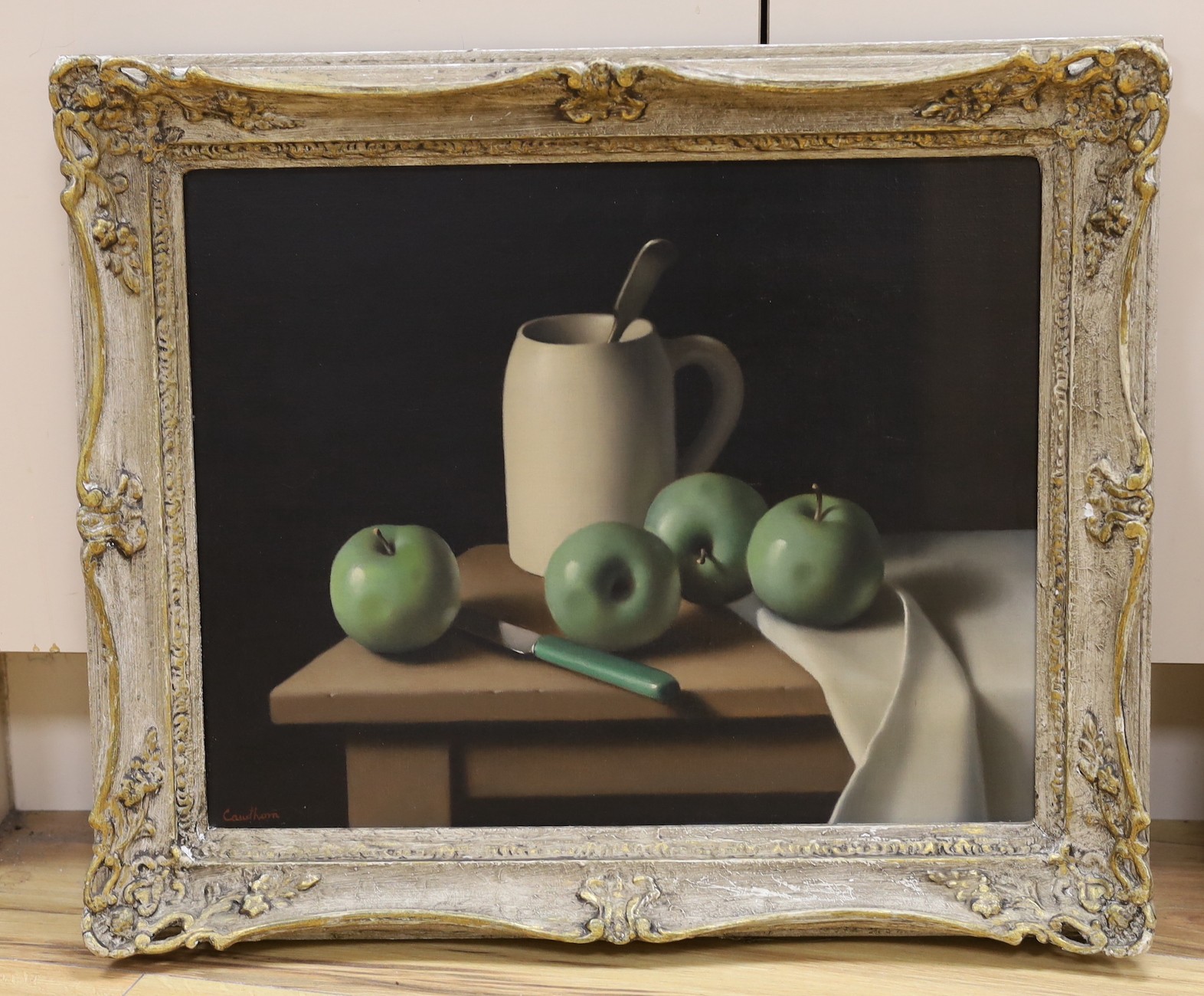 Christopher Cawthorne (20th C.), oil on canvas, Still life of apples and a mug upon a table top, signed, 40 x 50cm